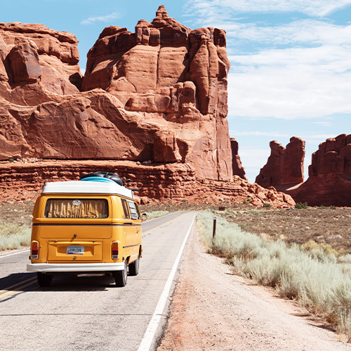 bun van bed on the street with mountain view