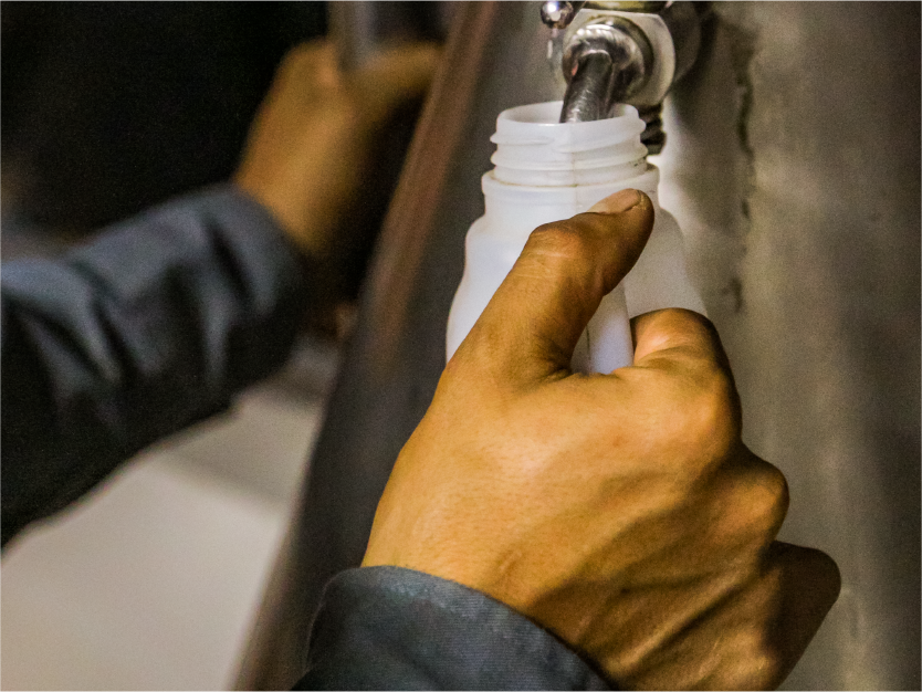 Image of cardamom oil being processed