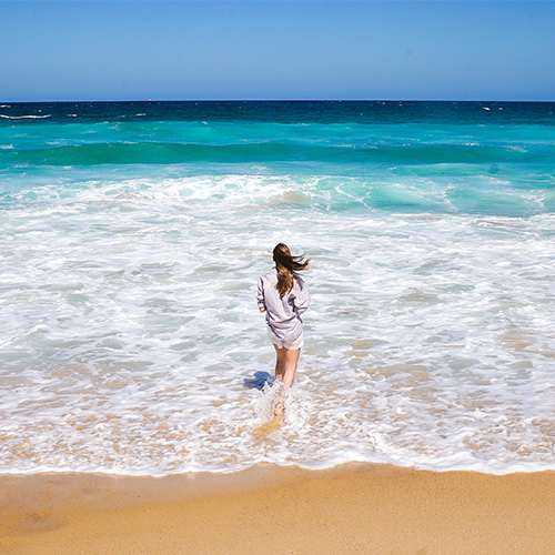 woman walking on the beach